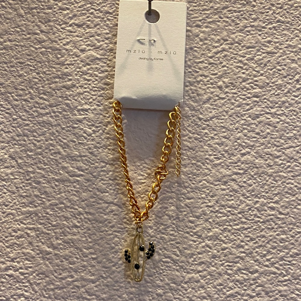 Gold Bracelet with Black Accents